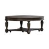 Hampton oval cocktail table showing reeded turned legs and lower shelf