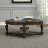 Hampton oval cocktail table with Satin Sienna finish in living room