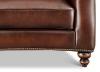 Hampton Leather Loveseat seat cushion, nailhead trim and turned wood leg detail
