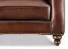 Hampton Leather Chair seat cushion, nailhead trim and turned wood leg detail