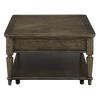 Liberty Furniture Maui Cocktail Table side view showing turned legs and open bottom shelf