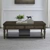 Liberty Furniture Maui Cocktail Table in Sienna finish displayed in a living room