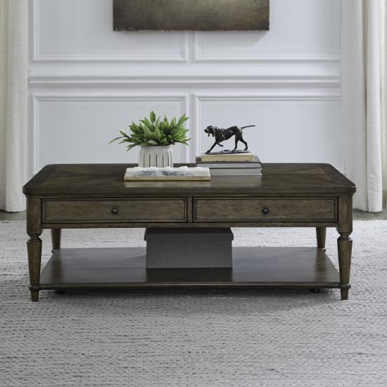 Liberty Furniture Maui Cocktail Table in Sienna finish displayed in a living room