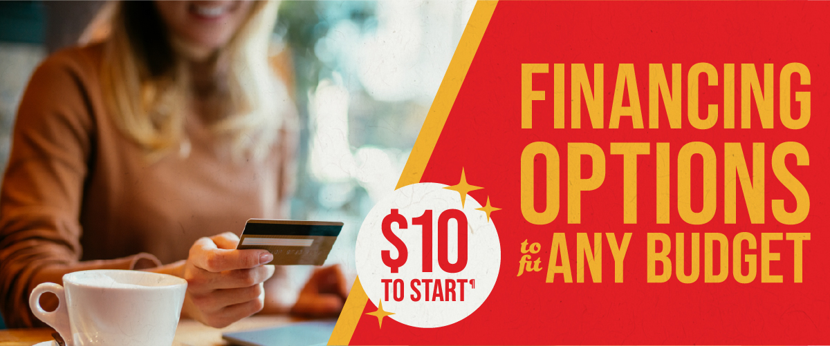 Person holding a credit card while using a laptop at a café, with text overlay reading “Financing options to fit any budget.”