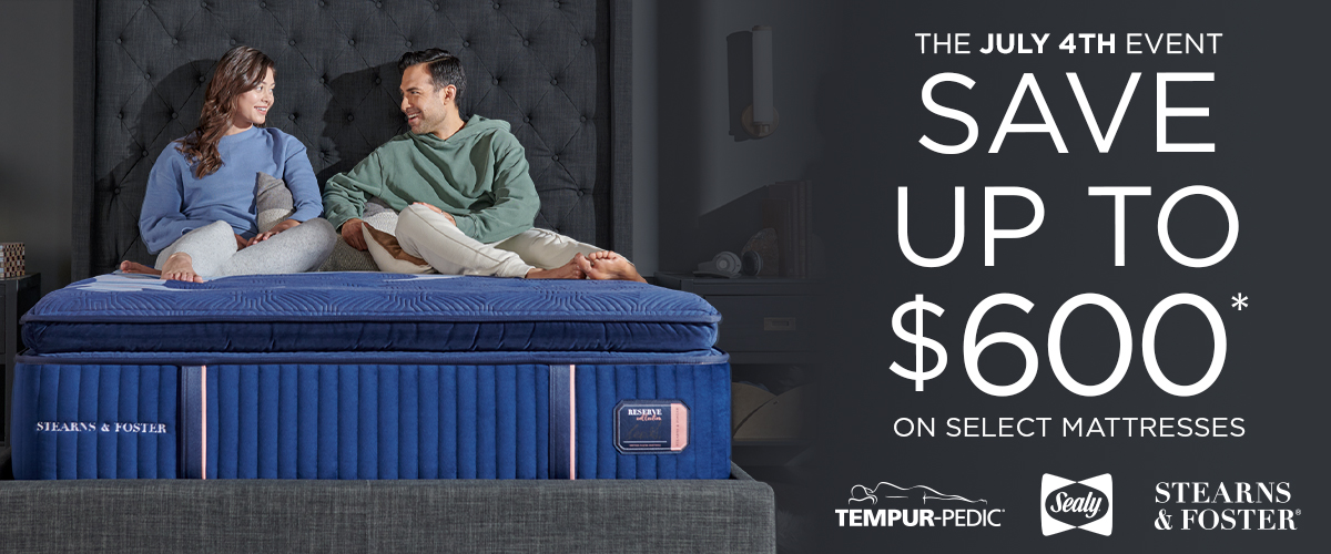 Stearns & Foster July 4th mattress sale banner featuring a couple relaxing on a luxury mattress with savings up to $600 on select Tempur-Pedic, Sealy, and Stearns & Foster mattresses.